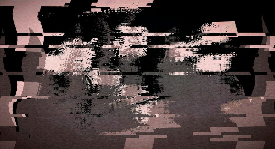 Multiple monitors showing video color grading software